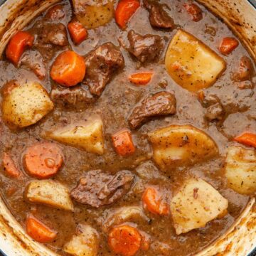 Close up overhead image of a pot of beef stew.
