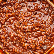 Homemade molasses baked beans in a pot.
