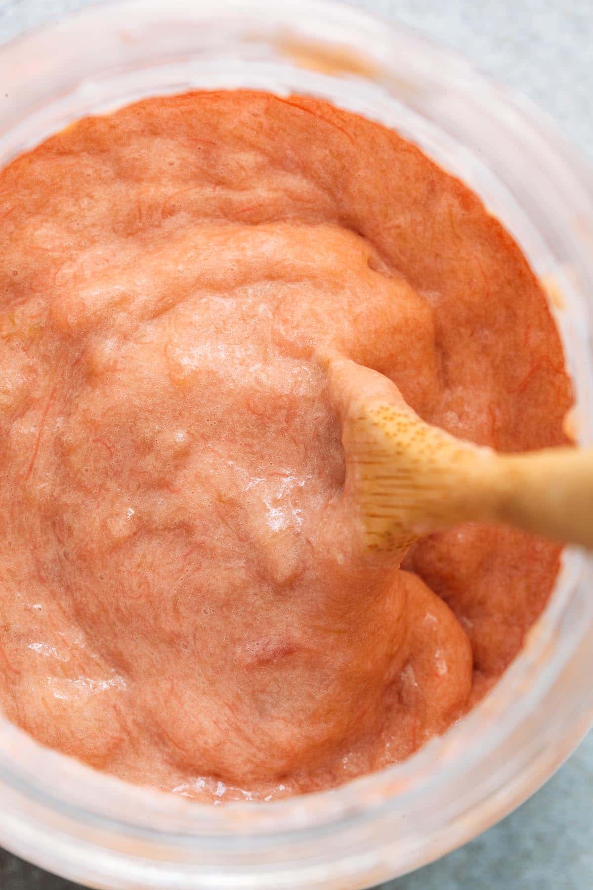 Close up of a jar of rhubarb curd.