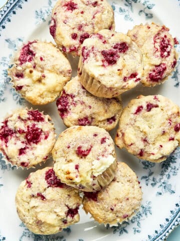Lemon raspberry muffins on a platter.
