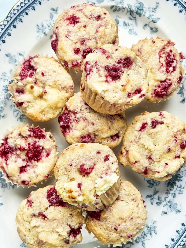 Lemon raspberry muffins on a platter.
