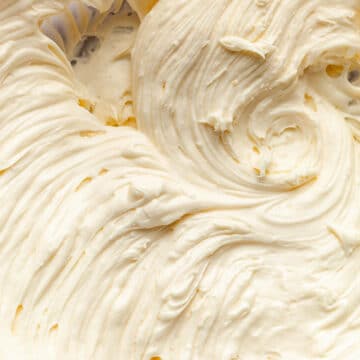 Close up overhead imahe of whipped cream cheese frosting.