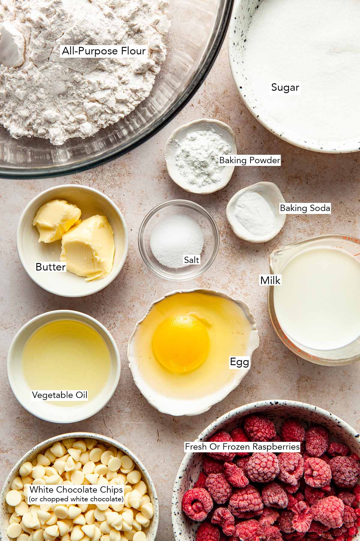 Ingredients to make raspberry and white chocolate loaf cake.