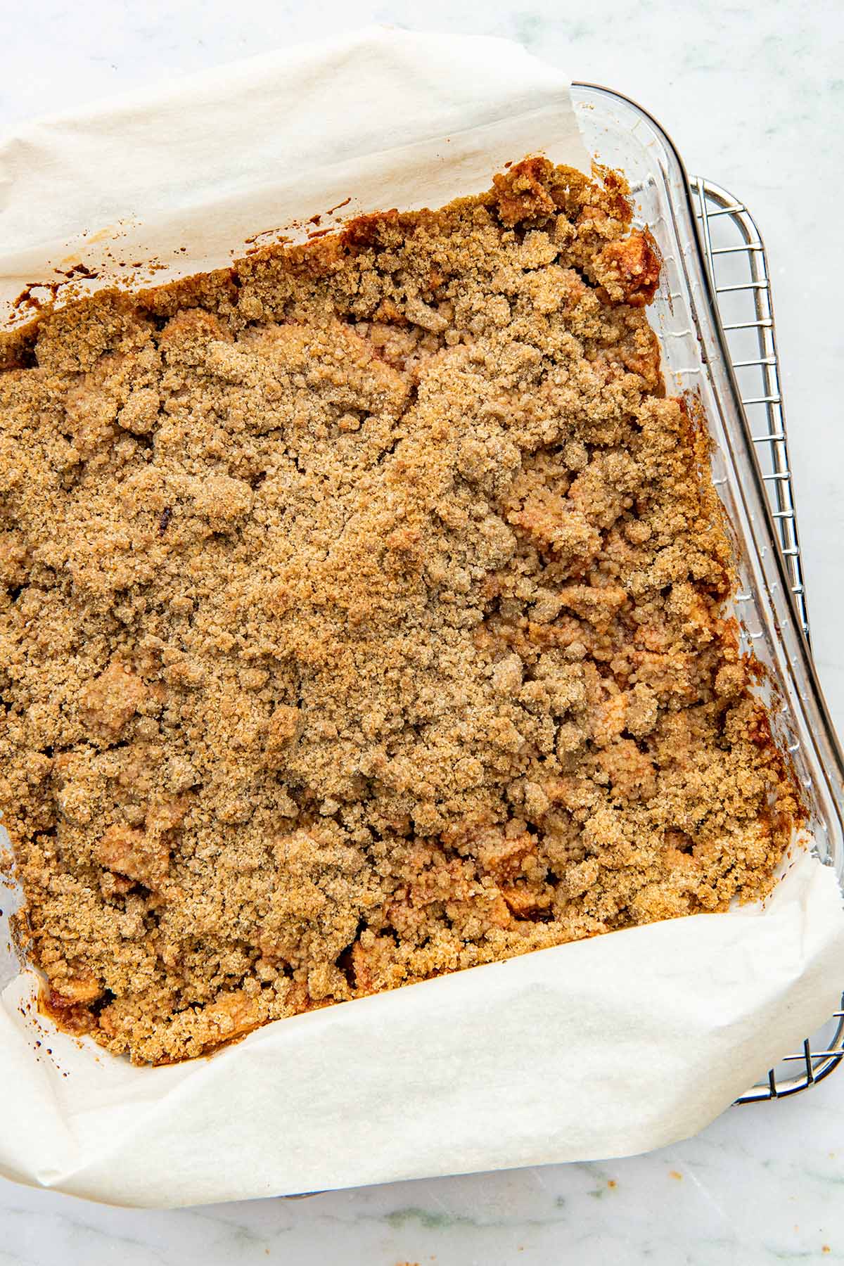 Close up overhead of a pan of baked crumble bars.