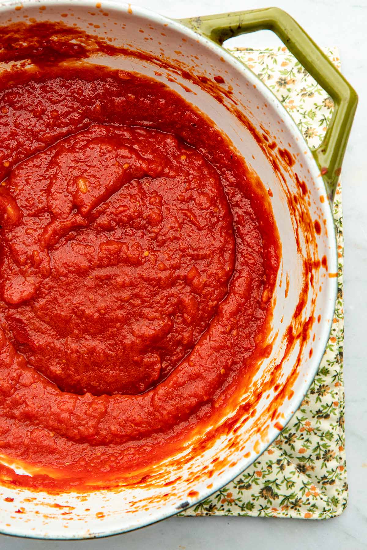 Close up of a pot of simple homemade tomato sauce.