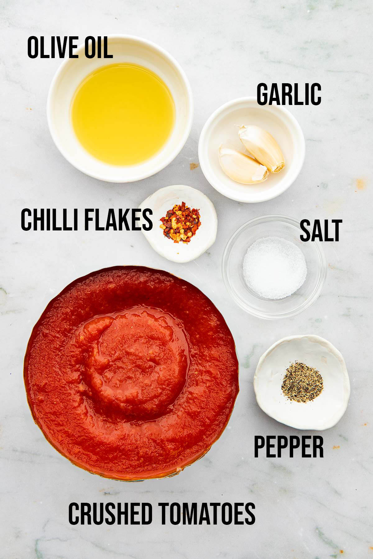 Ingredients to make small batch tomato sauce.
