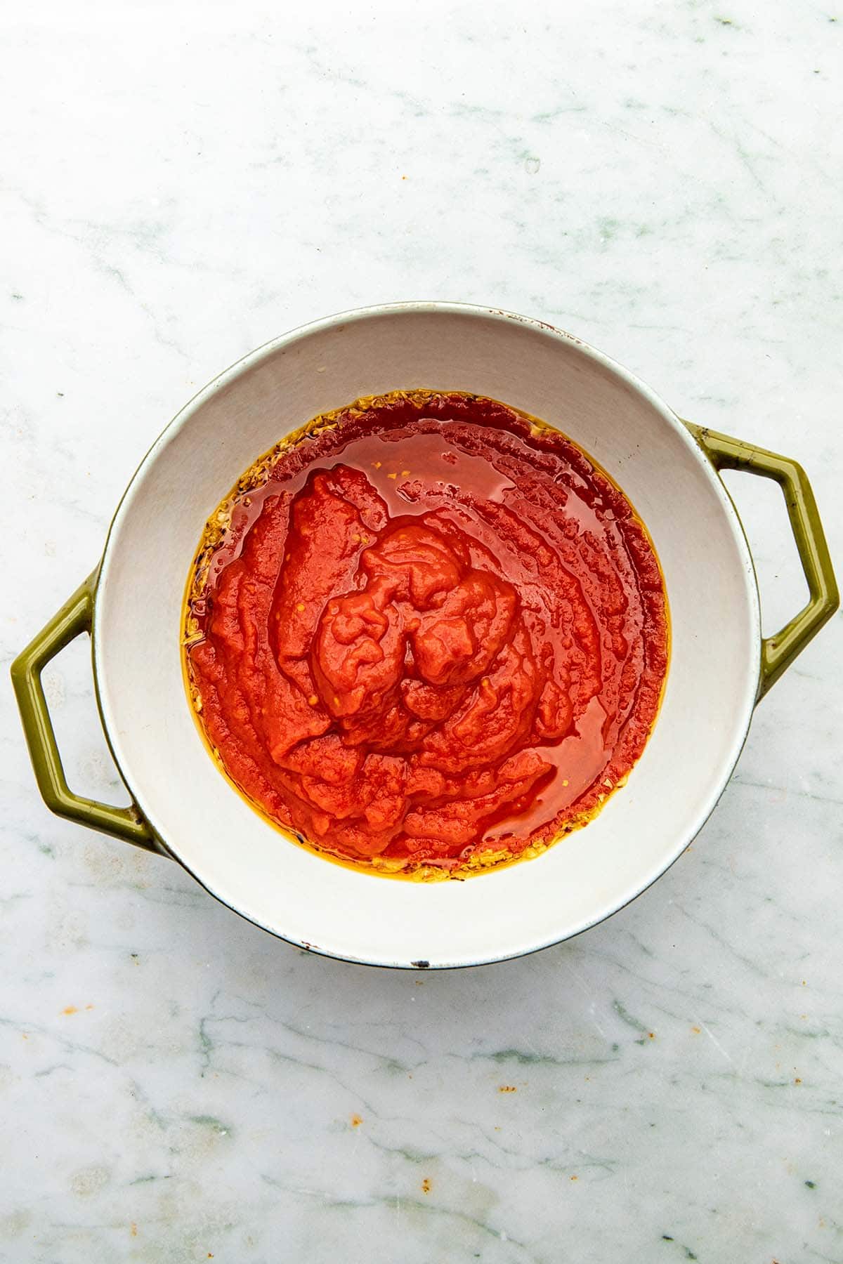 A pot of uncooked homemade tomato sauce.