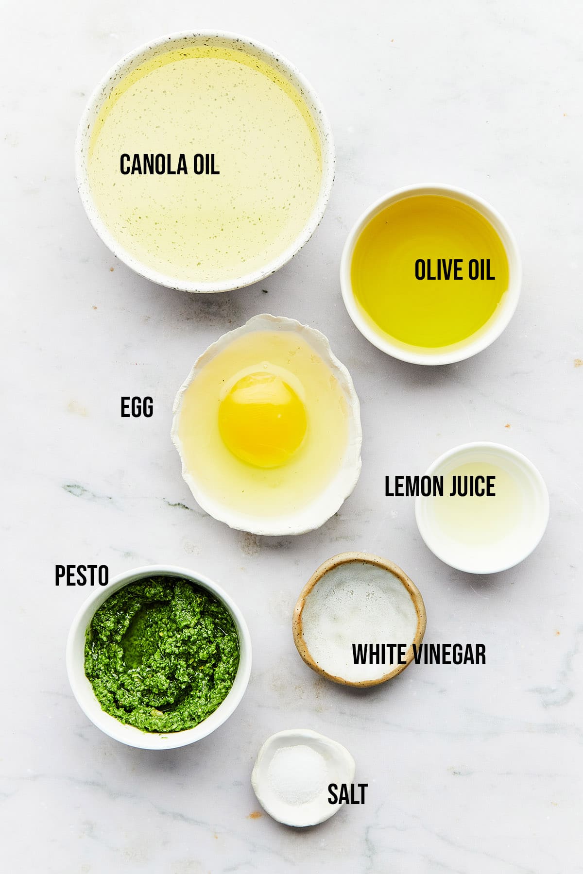 Ingredients to make pesto mayo.