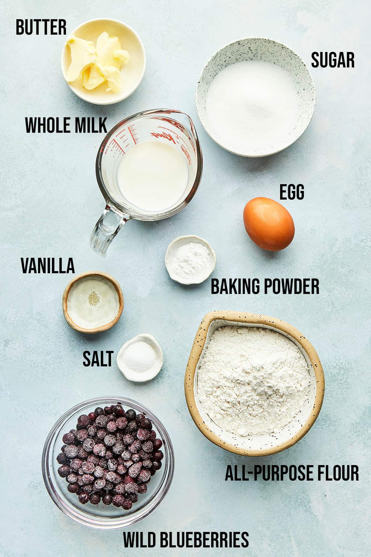Ingredients to make blueberry cake donuts.