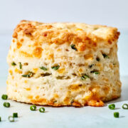 One of a batch of 12 cheddar chive biscuits.
