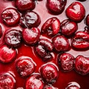 Close up of Cherries Jubilee in a skillet.
