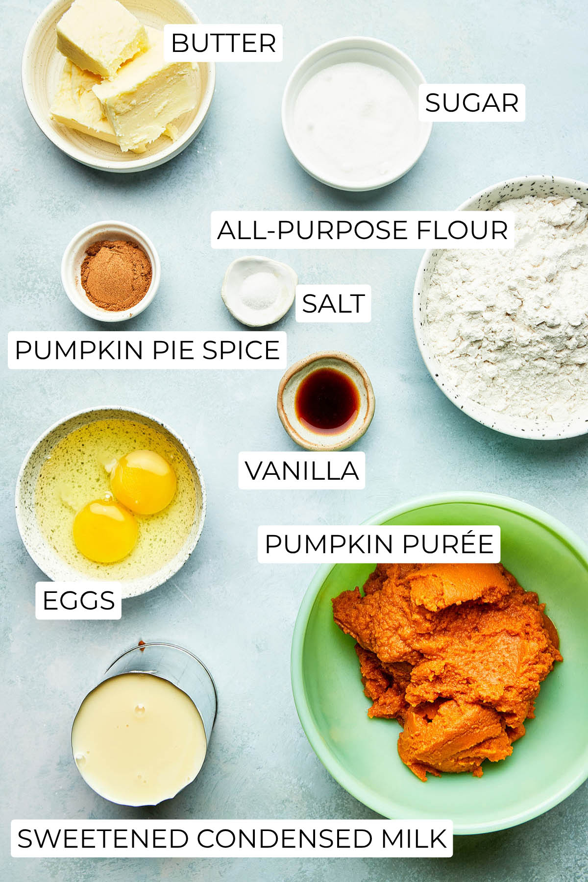 Ingredients to male pumpkin pie bars with shortbread crust.