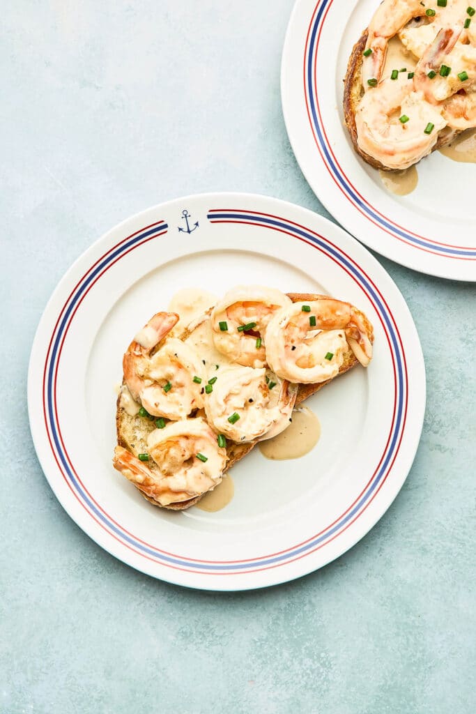Garlic shrimp with sherry cream sauce spooned over sourdough bread.