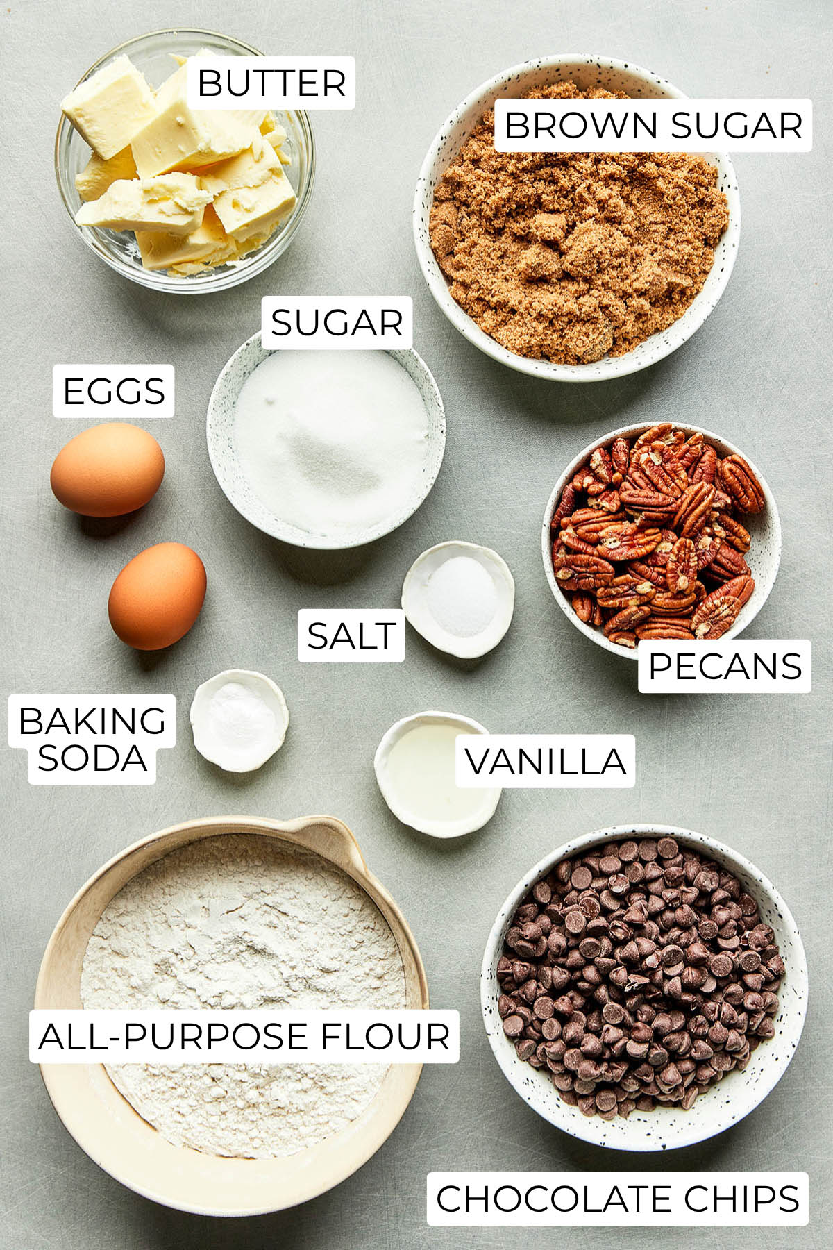 Ingredients to make chocolate chip pecan cookies.