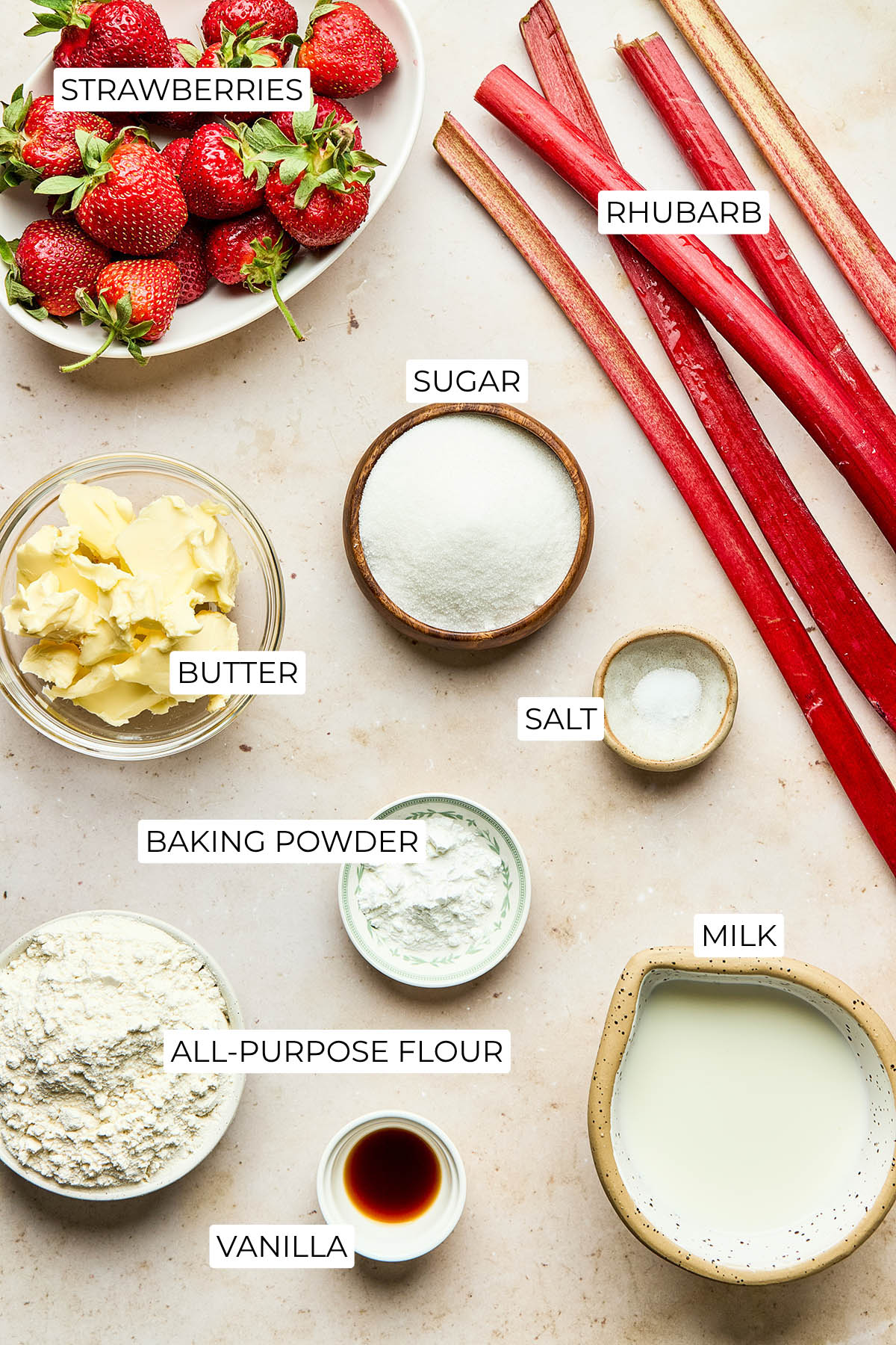Ingredients to make strawberry rhubarb cobbler.