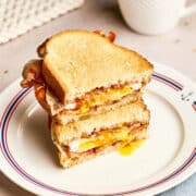 An Ingonish sandwich, sliced in half and stacked on a plate.
