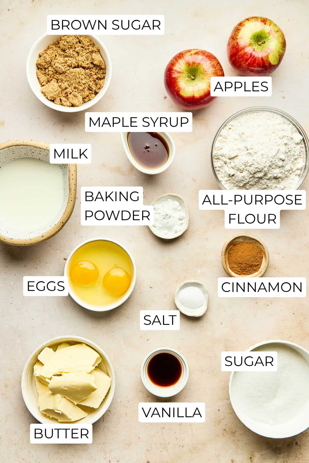 Ingredients to make an apple upside-down cake with maple syrup.