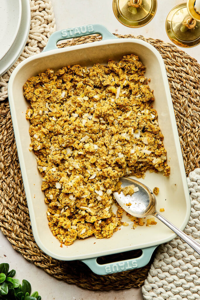 A baking dish of potato stuffing (mashed potato dressing with summer savory).