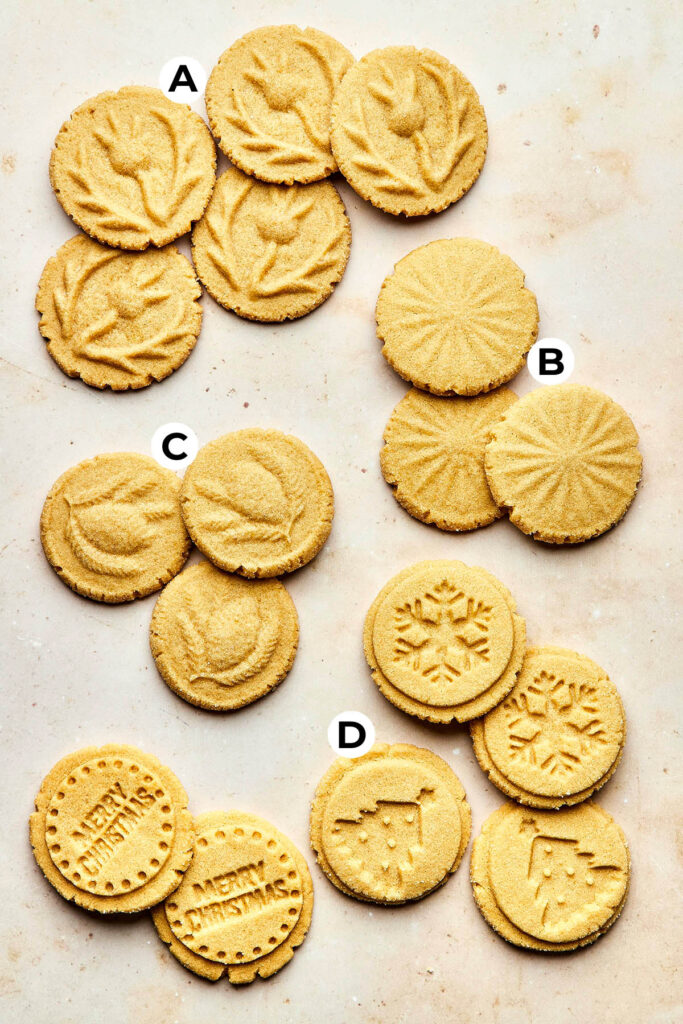 Stamped brown sugar shortbread cookies arranged by design and labeled A through D to show the finished impressions from each stamp.