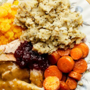 A plate of turkey dinner with potato stuffing, also called potato dressing.