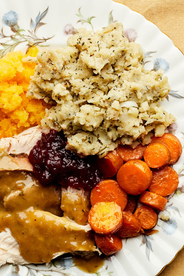 A plate of turkey dinner with potato stuffing, also called potato dressing.